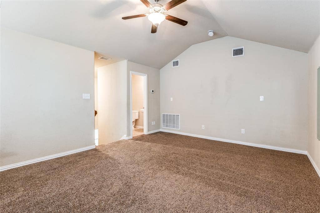 16425 Toledo Bend Court, Prosper, TX 75078 Spare room with ceiling fan and dark carpet
