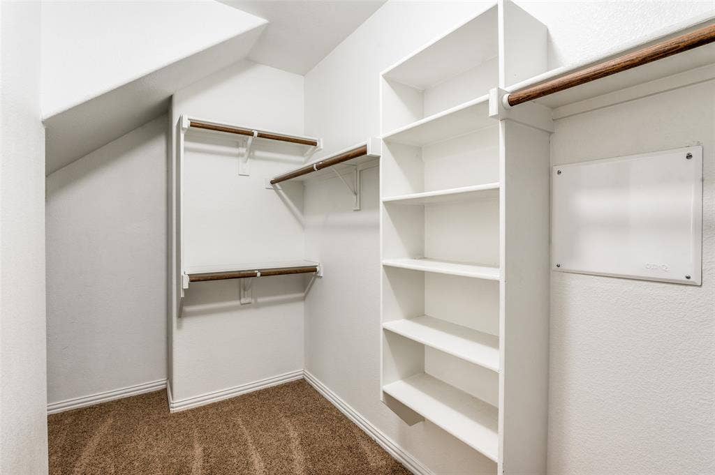 16425 Toledo Bend Court, Prosper, TX 75078 Walk in closet featuring dark carpet