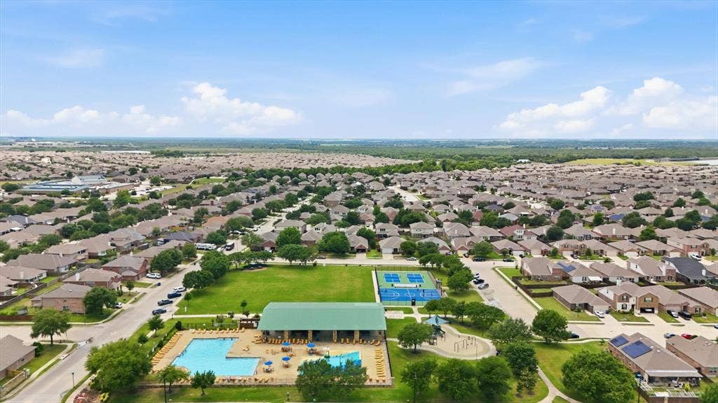 1212 Mount Olive Lane, Forney, TX 75126 Community amenity center. Pool #1 with children's splash pad, playground, pavillion and pickleball courts.
