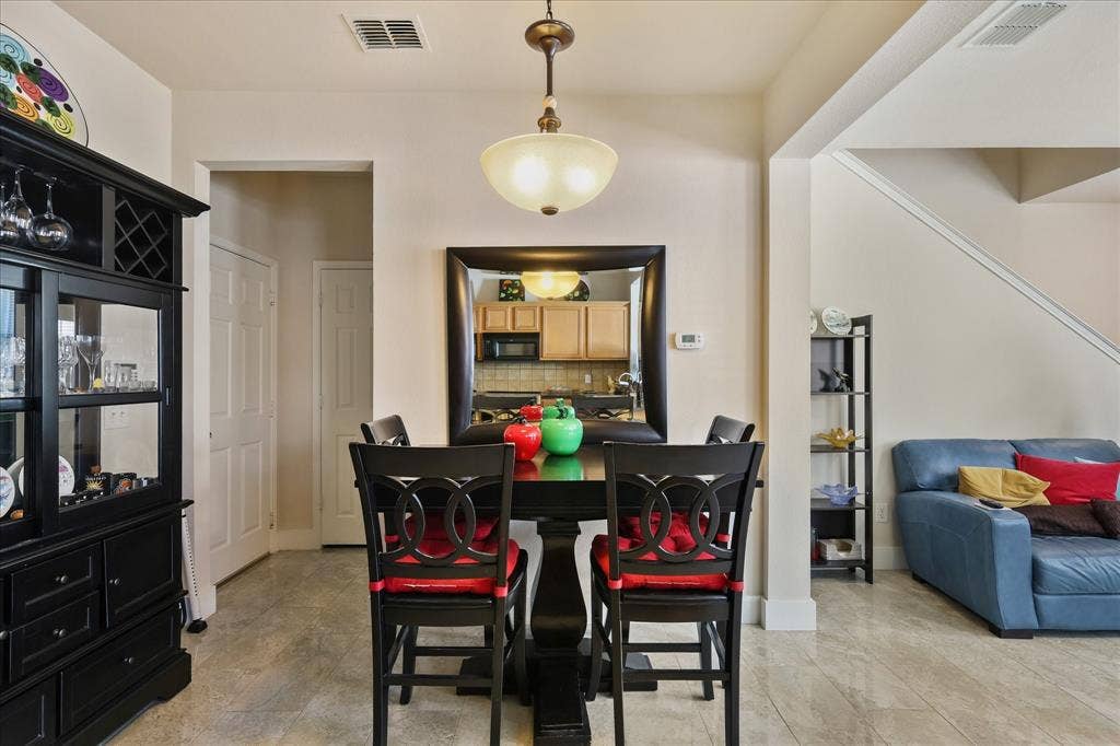 3025 Stone Forest Circle, McKinney, TX 75070 Dining room with baseboards