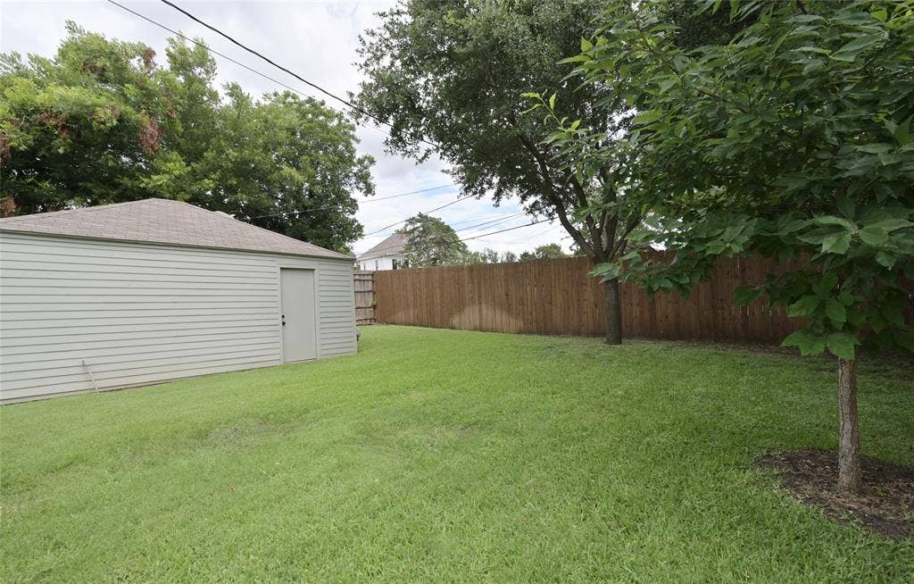 Large 8 ft privacy stained fenced backyard