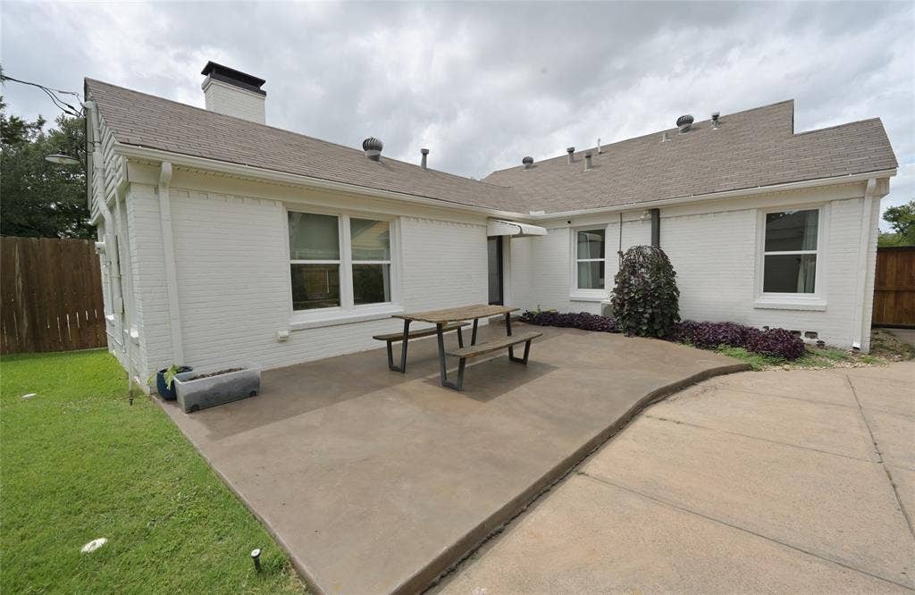 Large rear concrete entertaining patio