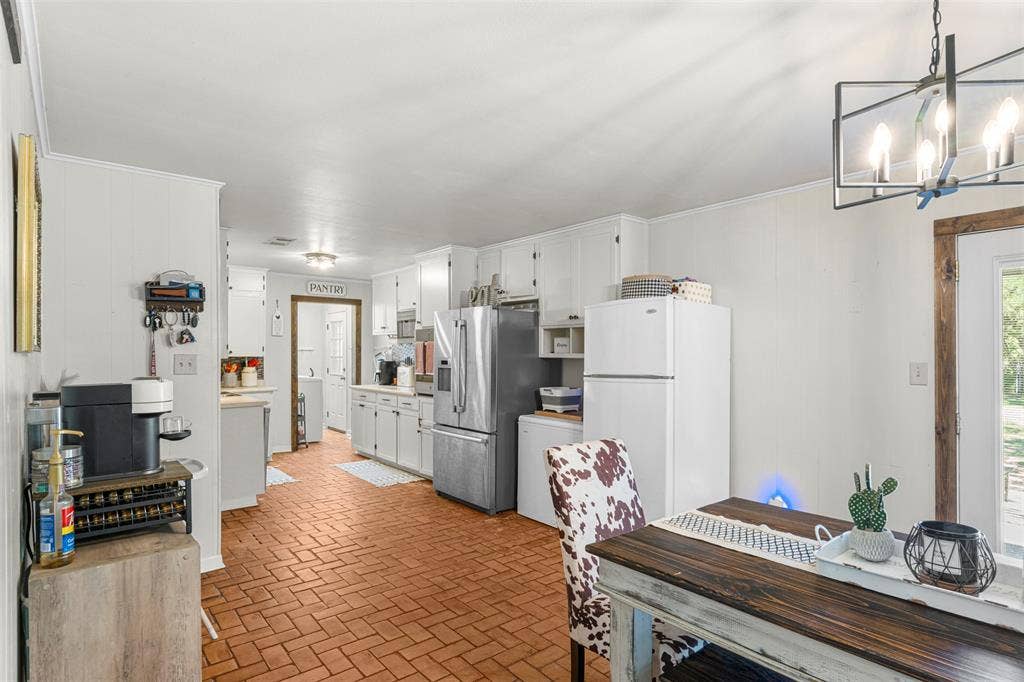 602 Colonial Drive, Athens, TX 75751 Kitchen with brick floors