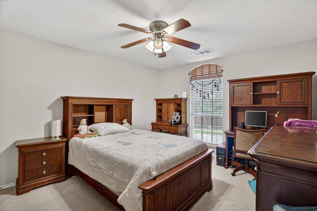 5212 Whisper Drive, Fort Worth, TX 76123 Bedroom featuring neutral-toned walls and carpet flooring