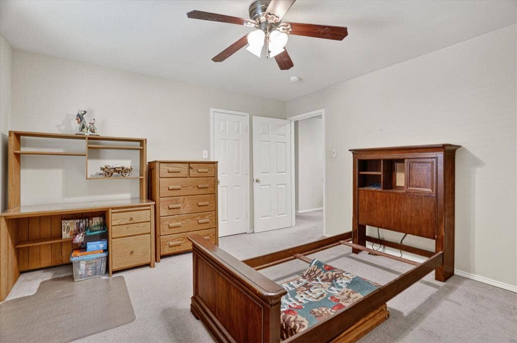 5212 Whisper Drive, Fort Worth, TX 76123 Carpeted room with light neutral walls and a ceiling fan