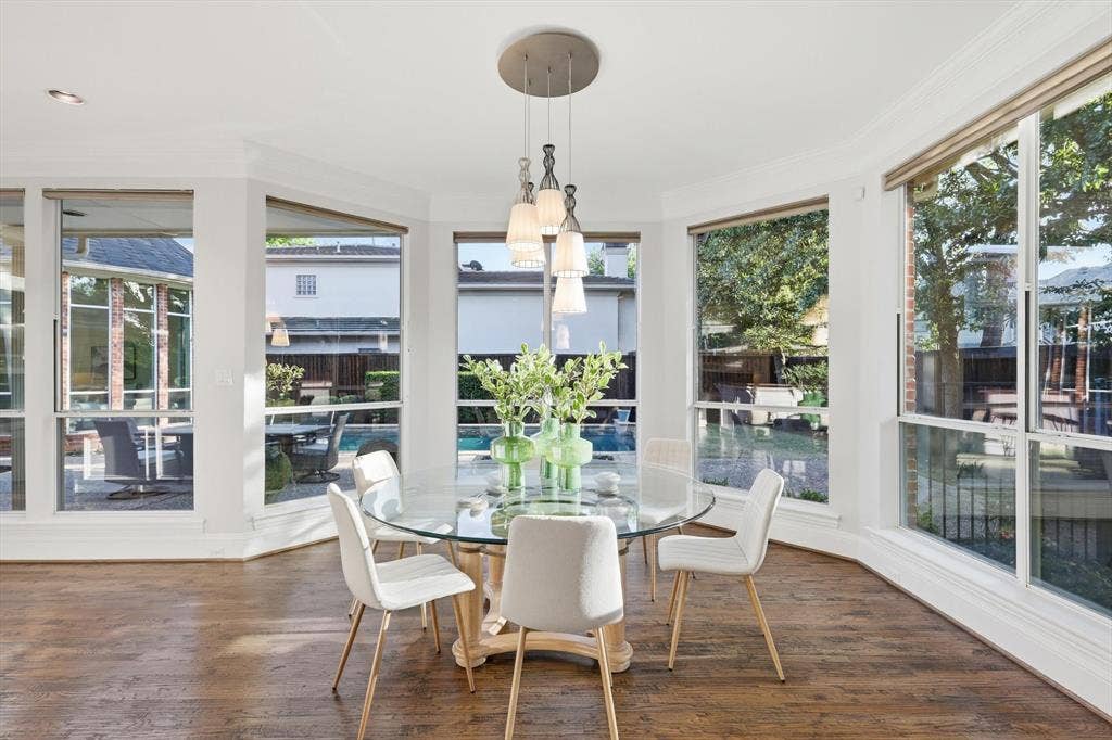 Conveniently located adjacent to kitchen and living space enjoying this light filled dining area .
