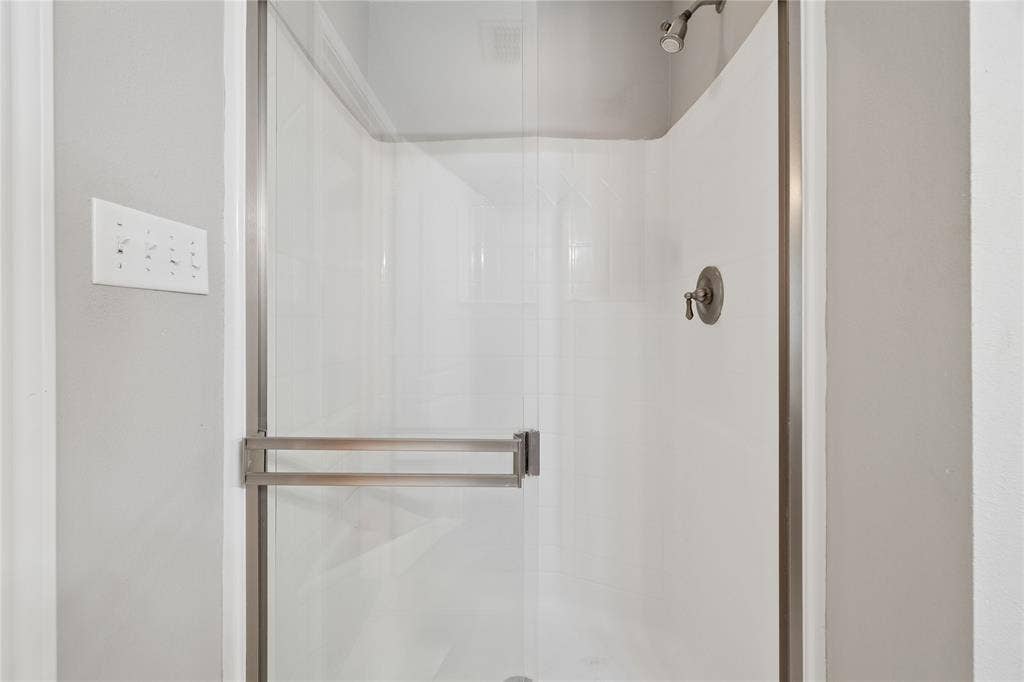 25 Starview Drive, Star Harbor, TX 75148 Bathroom with a stall shower