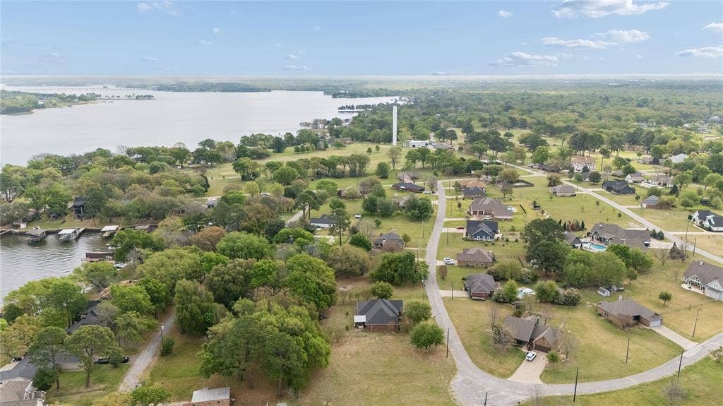 25 Starview Drive, Star Harbor, TX 75148 Aerial view of residential area with a large body of water
