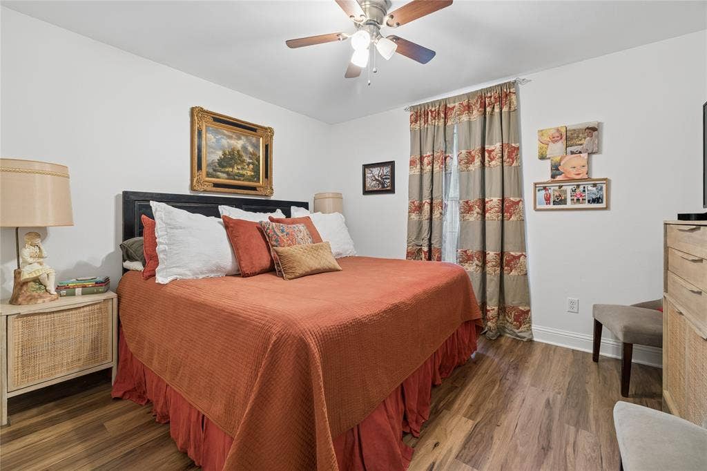 25 Starview Drive, Star Harbor, TX 75148 Bedroom with dark wood finished floors and a ceiling fan