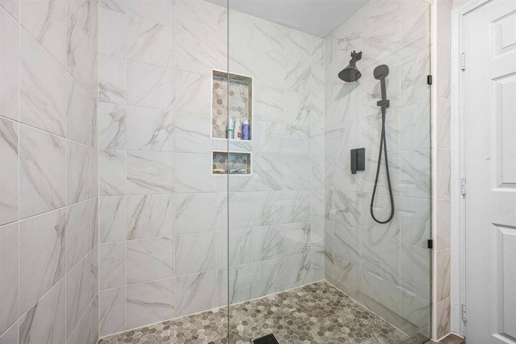Amazing oversized shower in the ensuite primary bathroom.
