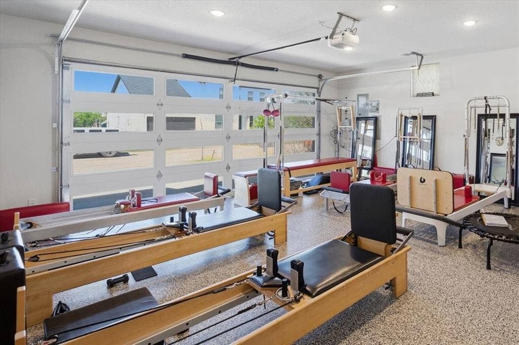 405 Point Vista Drive, Aledo, TX 76008 Garage previously used as Pilates Studio. Reformers & equipment have been removed & do not convey.