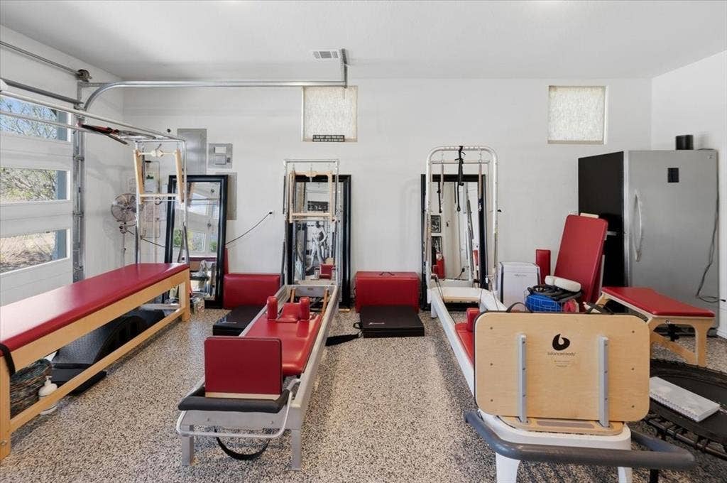 405 Point Vista Drive, Aledo, TX 76008 Garage previously used as Pilates Studio. Reformers & equipment have been removed & do not convey.