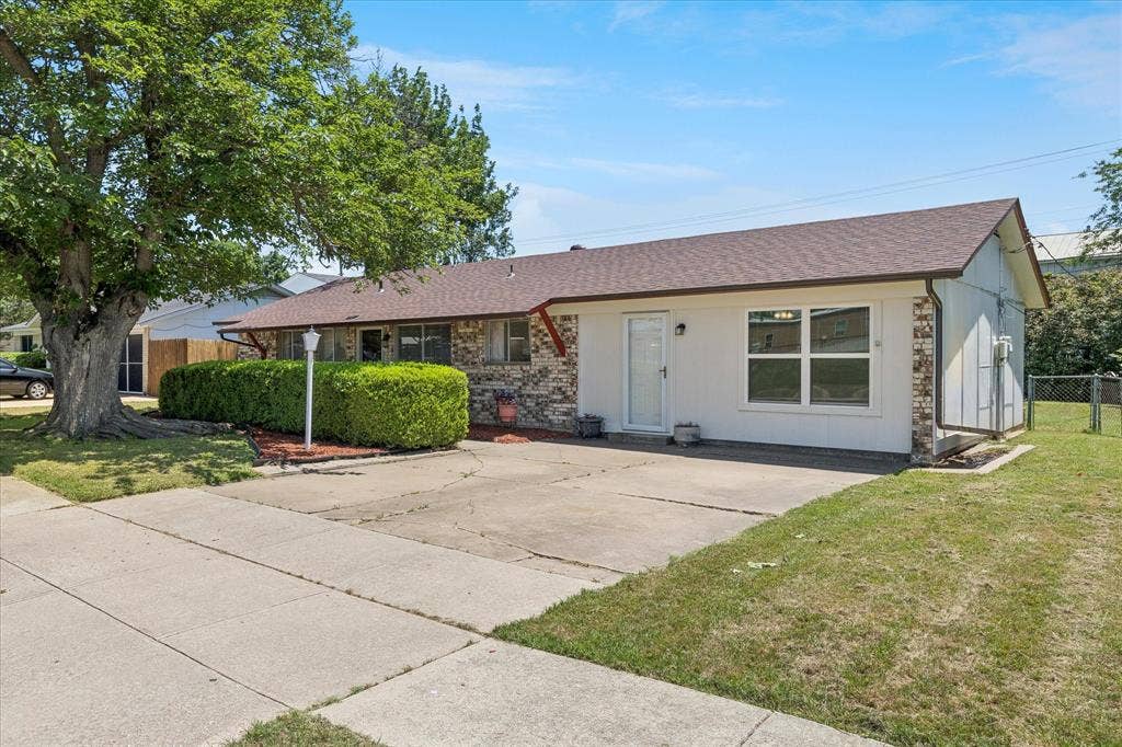 5820 Shipp Drive, Watauga, TX 76148 Single-story residence featuring a combination of brick and stucco siding