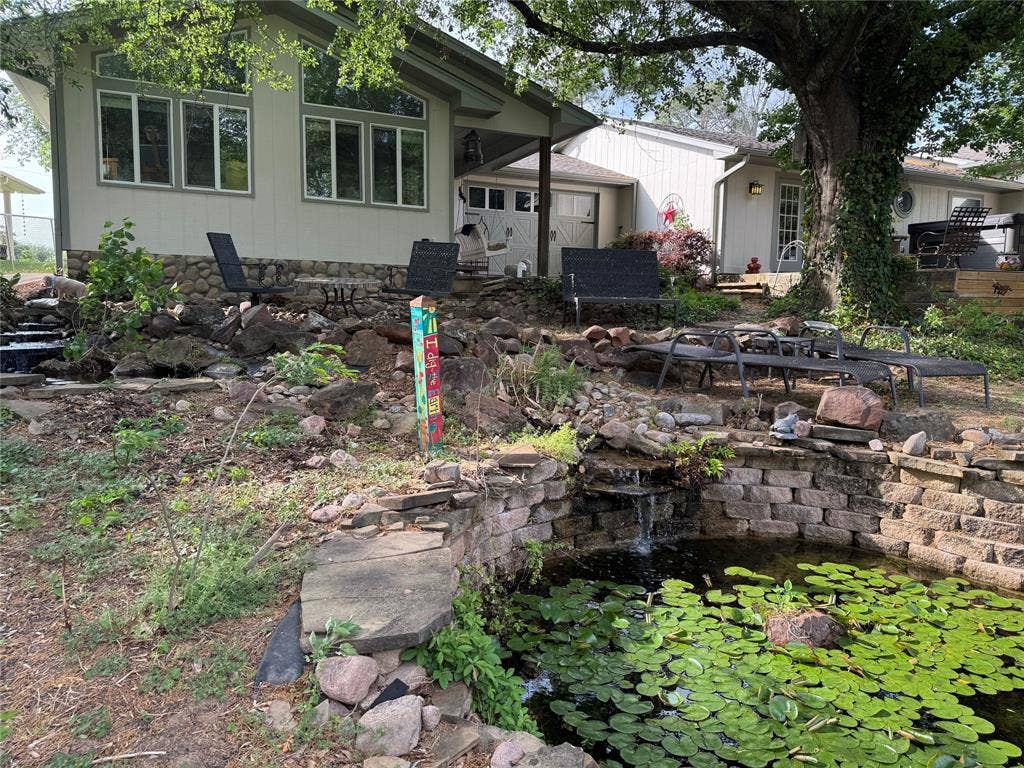 471 Stirrup Ranch Road, Trinidad, TX 75163 3 level cascading koi pond