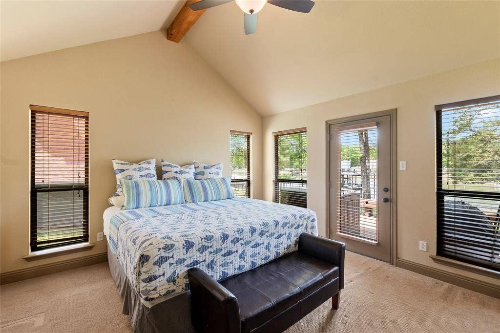 122 Lake Terrace Drive, Mabank, TX 75156 Main house waterside primary bedroom with door to back deck.