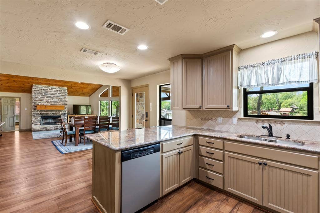 122 Lake Terrace Drive, Mabank, TX 75156 Kitchen includes electric range, microwave, and dishwasher.