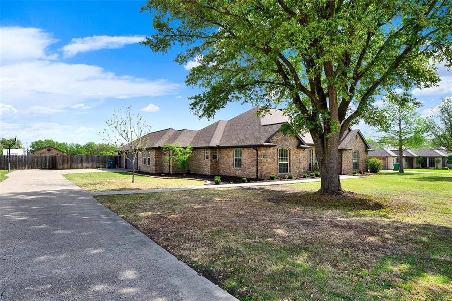 Property photo for 1201 E Oaklawn Drive, Talty, TX