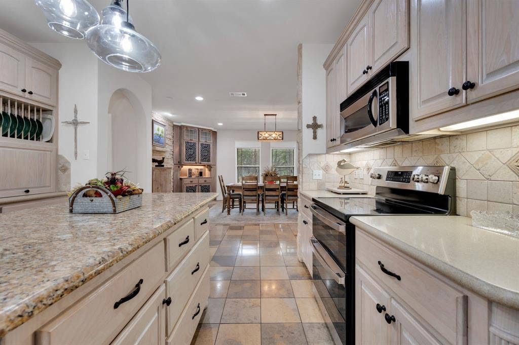 Additional kitchen view with detailed cabinetry and finishes