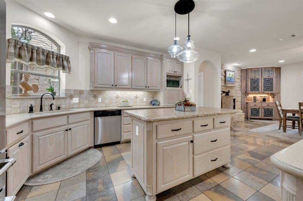Kitchen with large island and custom cabinetry
