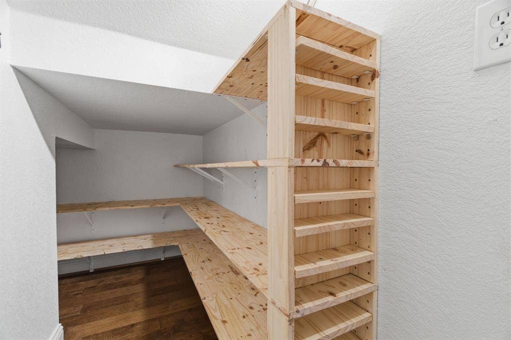 1104 9th Street, Argyle, TX 76226 Built in storage in under stair closet. Perfect for pantry overflow, household items, or toys!