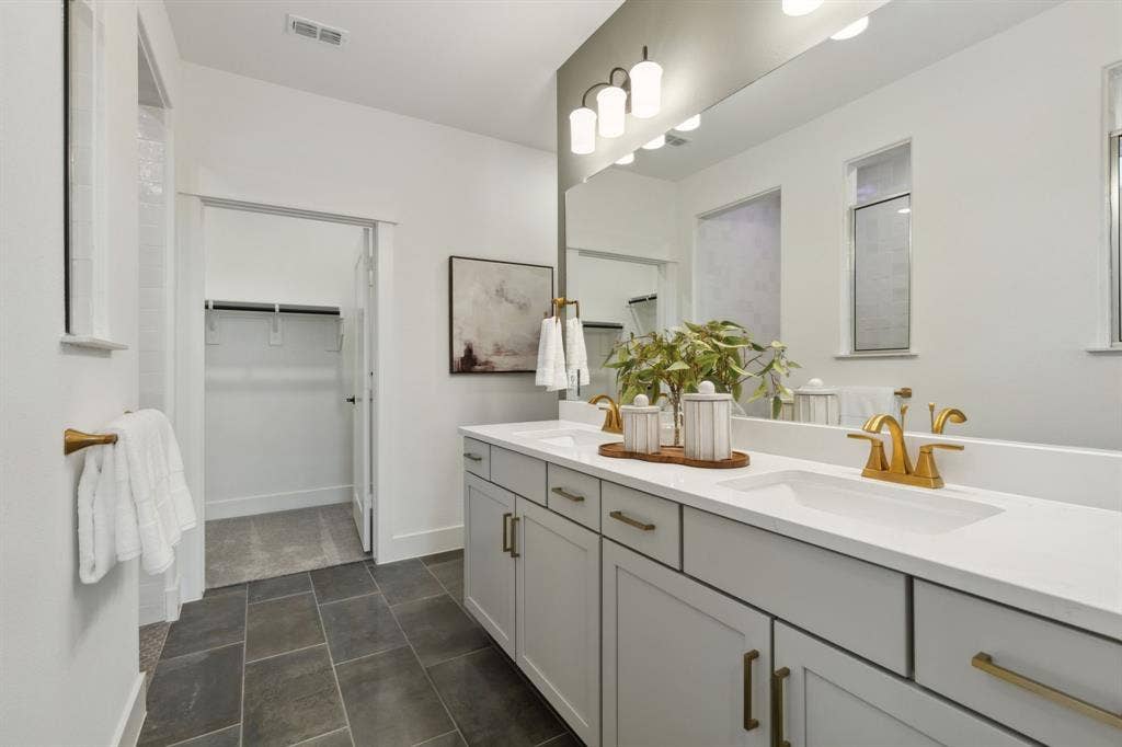 *Model Representation - Owner's private bath with double vanity