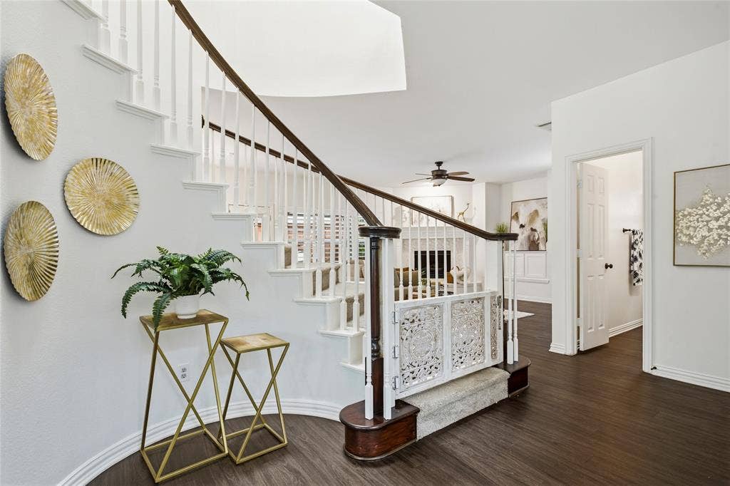 5201 Geode Lane, McKinney, TX 75072 Home features stunning architectural curved walls. throughout. Gate has been removed at bottom of staircase.