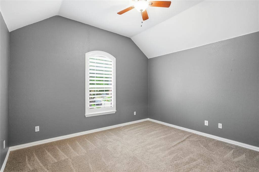5201 Geode Lane, McKinney, TX 75072 Secondary bedroom with beautiful slate color designer paint.