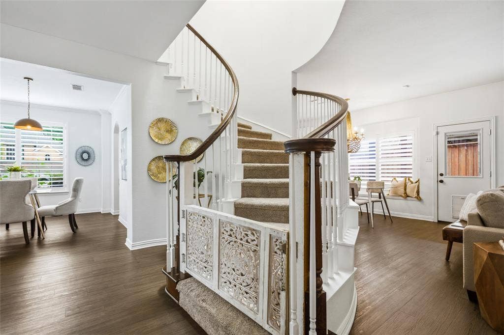 5201 Geode Lane, McKinney, TX 75072 Gorgeous curved staircase.Gate is no longer at bottom of staircase.