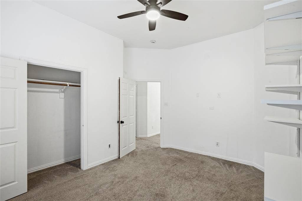 5201 Geode Lane, McKinney, TX 75072 Spare bedroom with removable wall shelves.