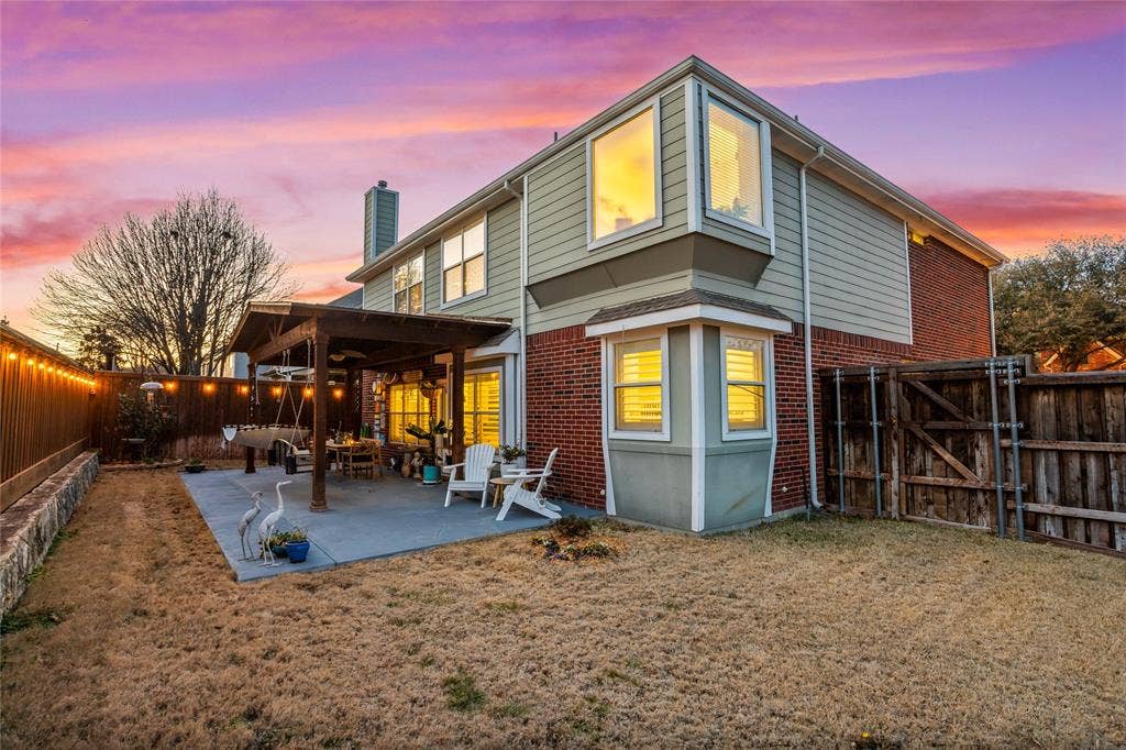 5201 Geode Lane, McKinney, TX 75072 Looking at covered porch from side backyard.
