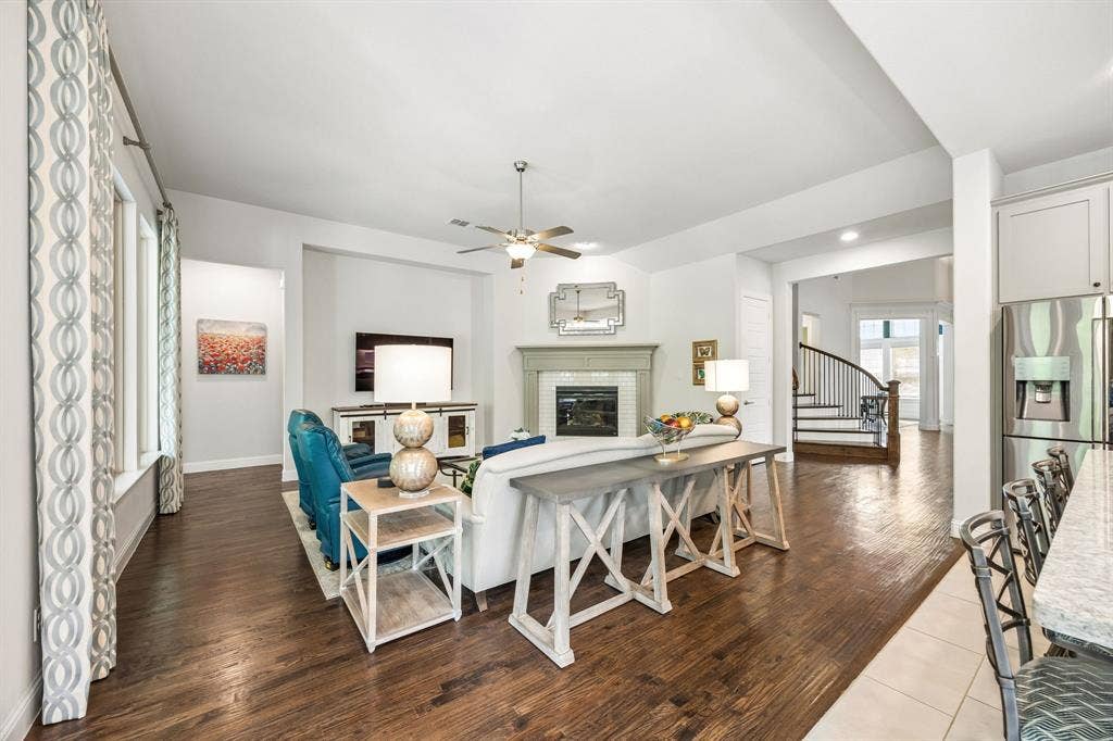 Open-concept living at its best!  A light-filled family room open to the kitchen yet is connected to the rest of the home.