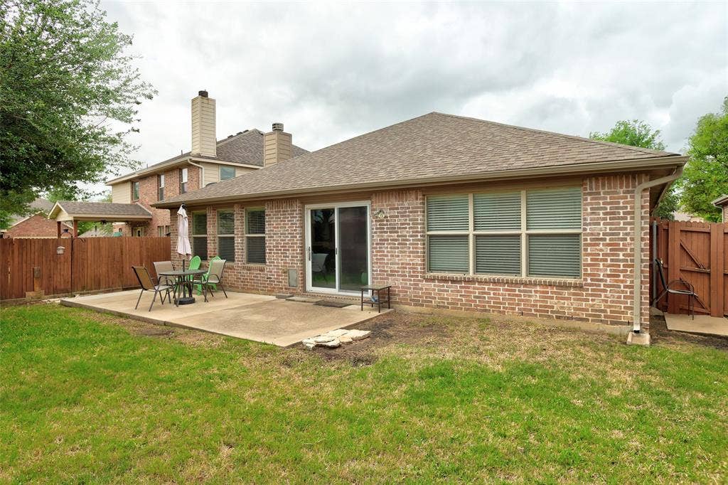 1913 Hidden Fairway Drive, Wylie, TX 75098 Back yard patio and back of home
