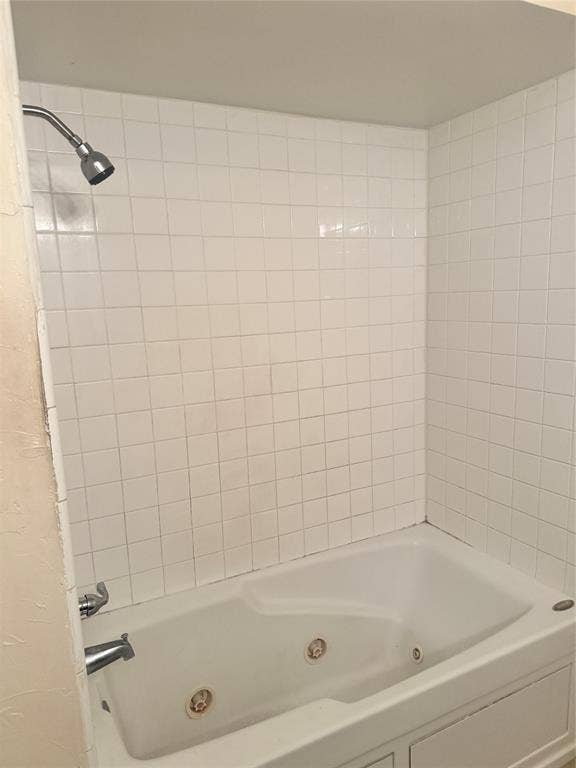 2301 Holly Drive, Euless, TX 76039 White tiled shower enclosure with a built-in jetted tub and chrome fixtures