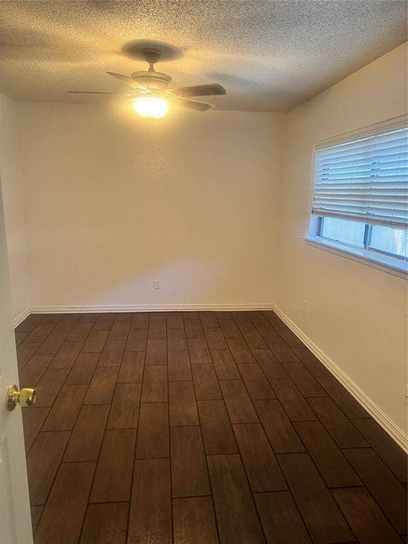 2301 Holly Drive, Euless, TX 76039 Room featuring wood-look tile flooring, a ceiling fan with integrated lighting, and a window with blinds