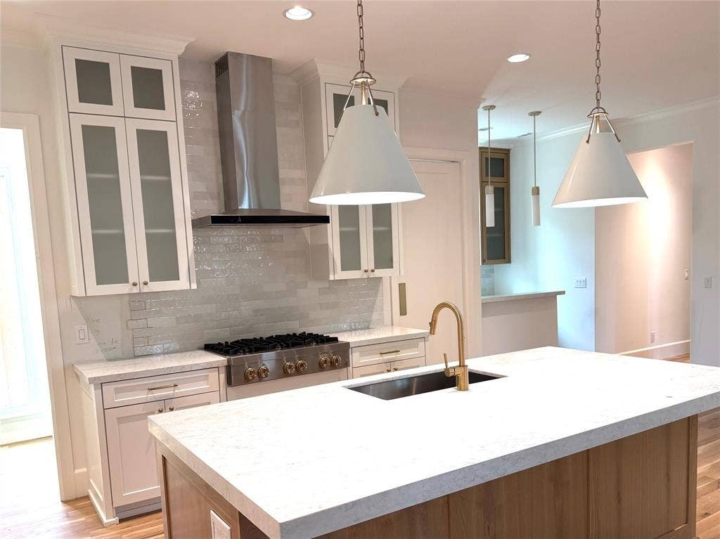4347 DELMAR Avenue, Dallas, TX 75206 Kitchen with glass front cabinetry