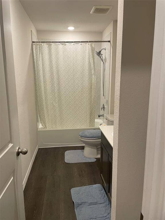 468 Unbridled Road, Waxahachie, TX 75165 Full bath featuring vanity, dark wood finished floors, and shower / tub combo with curtain