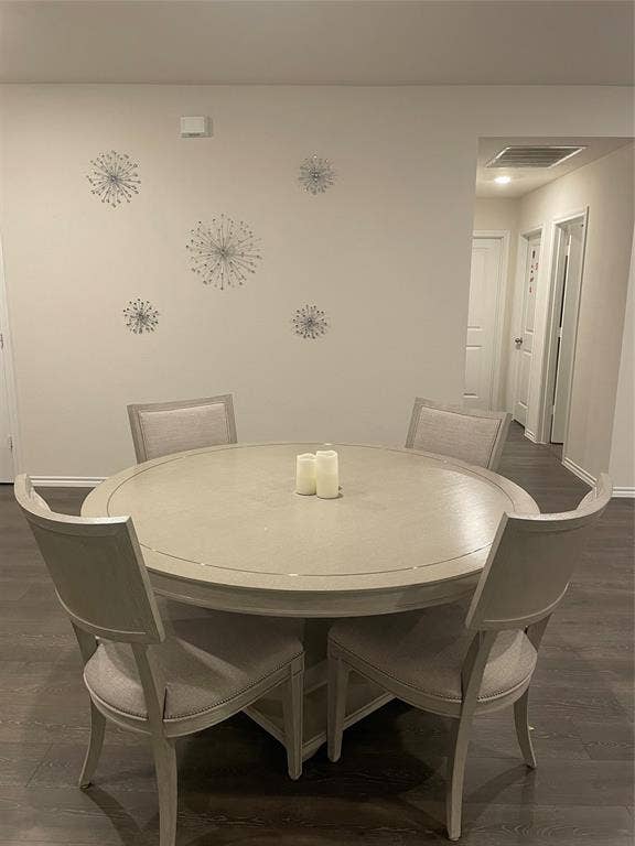 468 Unbridled Road, Waxahachie, TX 75165 Dining area with dark wood finished floors and baseboards