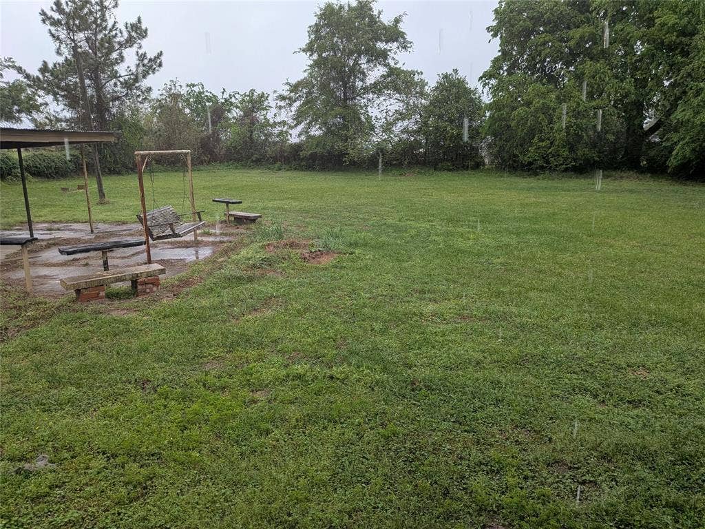 2009 County Road 4619, Athens, TX 75752 View of grassy yard with a patio area