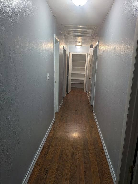 2009 County Road 4619, Athens, TX 75752 Hall featuring dark wood-style flooring and baseboards