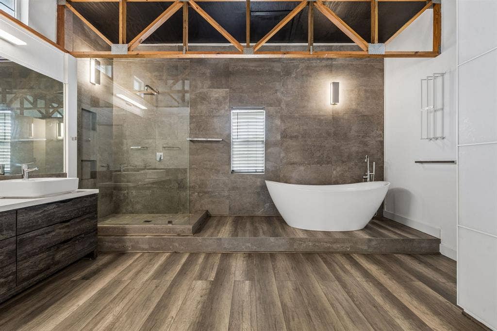 6360 Curtis Street, Plano, TX 75093 Walk in shower and separate soaking tub. Wood beam ceiling detail.
