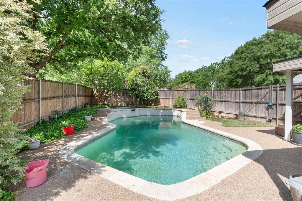 1608 Mountain Laurel Drive, Keller, TX 76248 View of swimming pool featuring patio surround and a fenced backyard