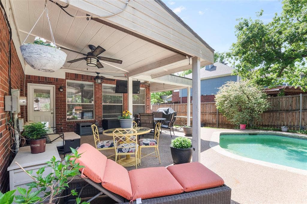 1608 Mountain Laurel Drive, Keller, TX 76248 Fenced backyard with ceiling fan, a patio area, and outdoor dining space