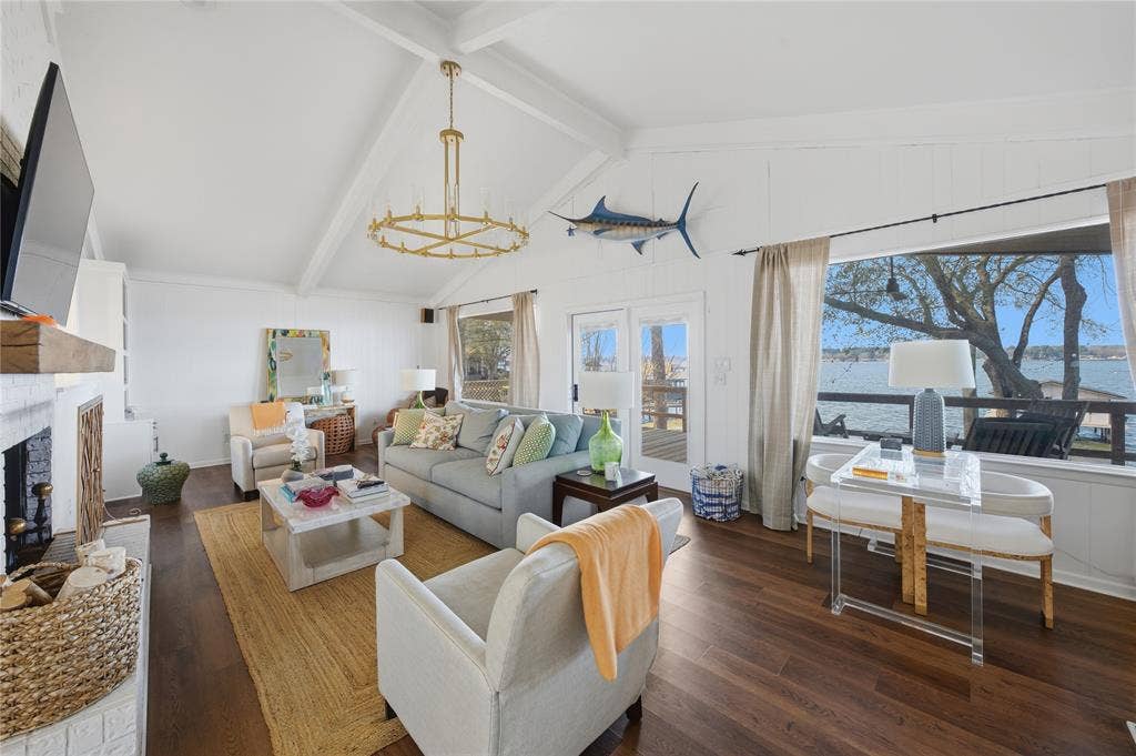 124 Shoreline Circle, Malakoff, TX 75148 Main living space with vaulted ceiling, fireplace and picture window full of big lake views!