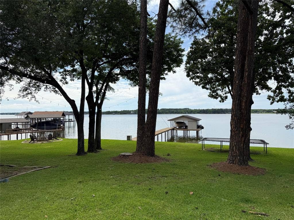 124 Shoreline Circle, Malakoff, TX 75148 Huge well established lawn beneath massive shade trees.