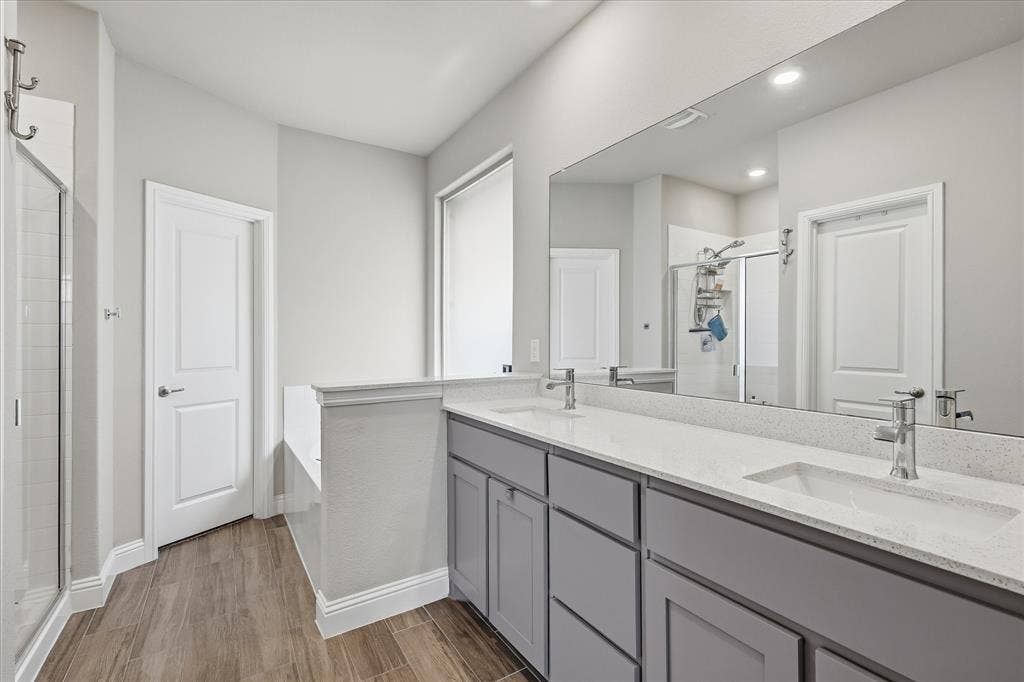 Spacious and relaxing Master bath with walk in shower and lovely tub to relax in, double sinks