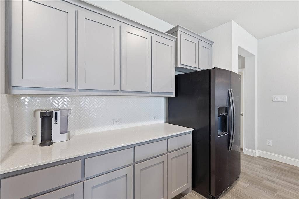 Basketweave backsplash and neutral color palette that goes with everything!