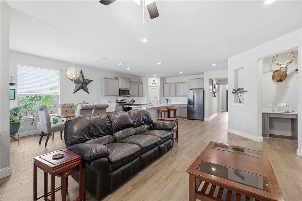 Office area or nook for kids or pets to hang out off of the living area