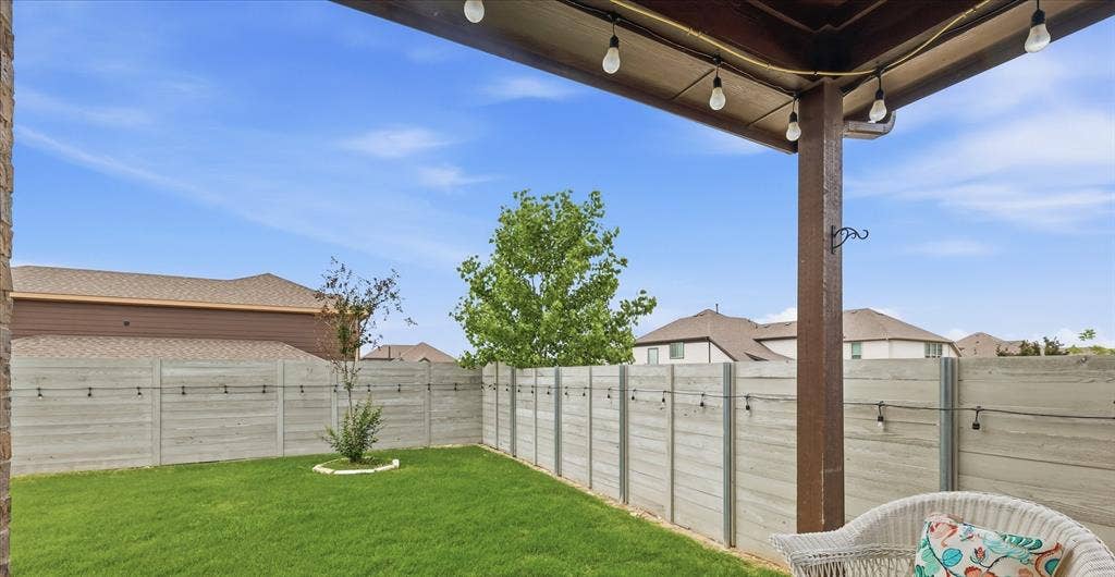 Expansive corner lot with backyard privacy and covered porch area