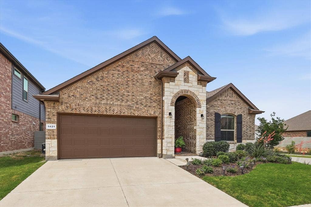 Two car garage and the corner lot for extra room