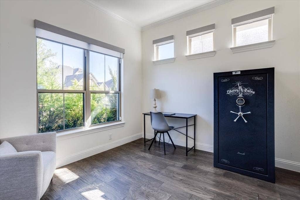Dedicated study with an abundance of natural lighting and french doors.